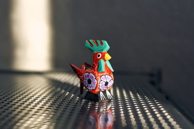 Close-up of alebrije on table