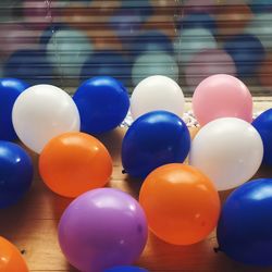 High angle view of colorful balloons on table