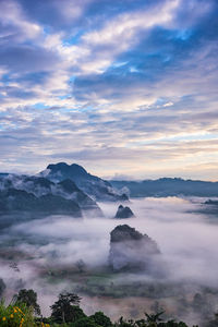 Scenic view of mountains against sky during sunset