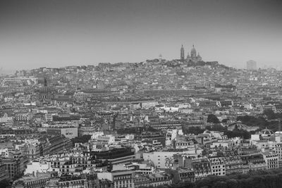 Cityscape against clear sky