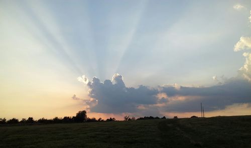 Scenic view of landscape against sky during sunset