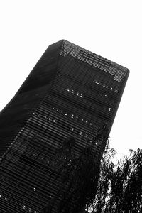 Low angle view of skyscraper against clear sky