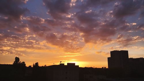 Low angle view of dramatic sky during sunset