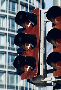 Low angle view of not working street lights 