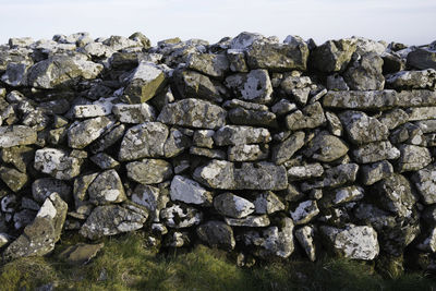 Sunlit dry stone wall