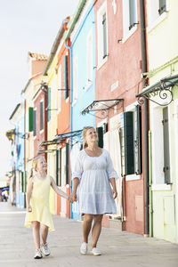 Mother with daughter walking