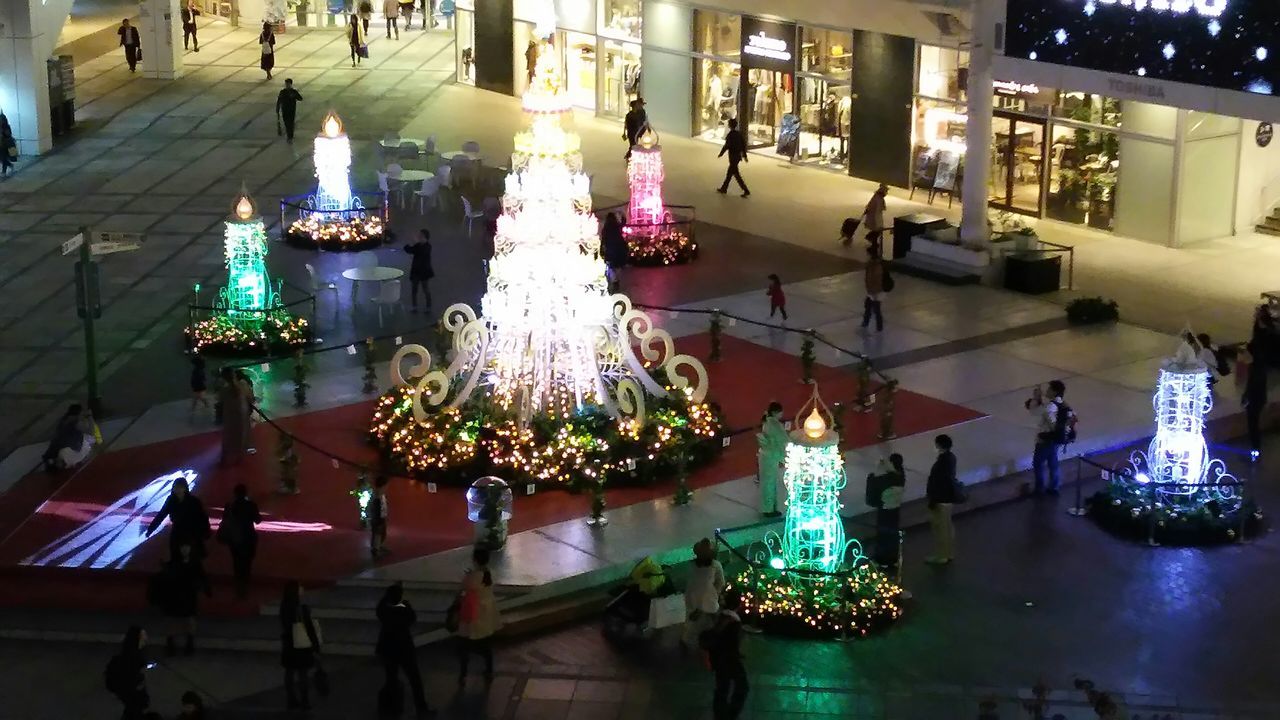 illuminated, night, lighting equipment, built structure, architecture, indoors, decoration, building exterior, chair, hanging, reflection, table, electric light, light - natural phenomenon, city, modern, incidental people, no people, absence, ceiling