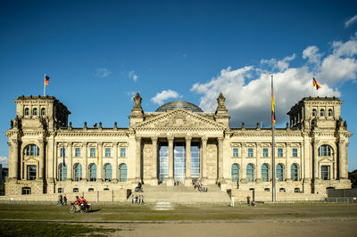 Tourists in front of historic building