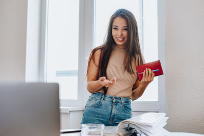 Young woman using mobile phone