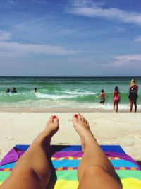 Scenic view of beach against blue sky