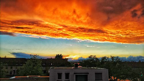 Cityscape against sky during sunset