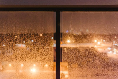 Full frame shot of window during rainy season