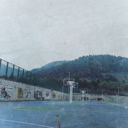 Scenic view of soccer field against sky