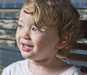 Portrait of smiling boy looking away
