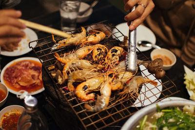 Midsection of man holding food