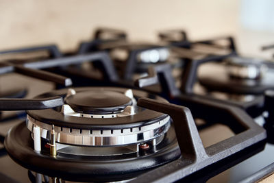 Gas stove with hob in kitchen, close up