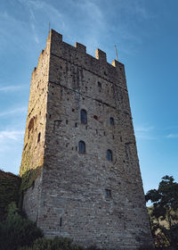 Low angle view of historic building against sky