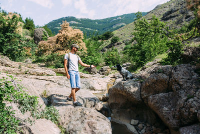 Rear view of man looking at mountain