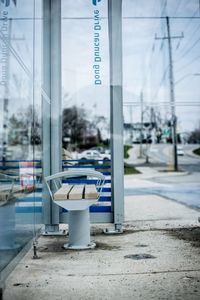 Empty seat at bus stop