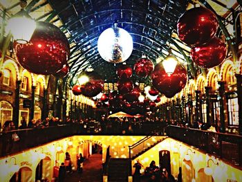 Low angle view of hanging lights hanging on ceiling