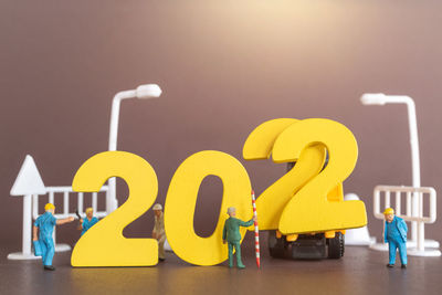 Close-up of yellow toy on table