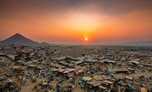 High angle view of townscape against sky during sunset