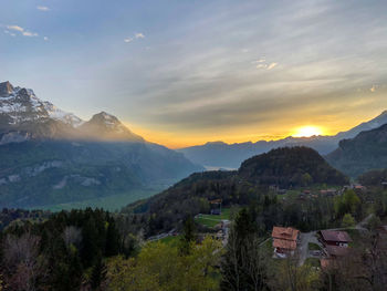 Scenic view of mountains against sky during sunset