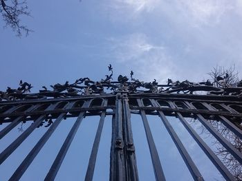 Low angle view of statue against sky