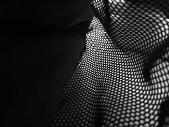 Close-up of net in darkroom