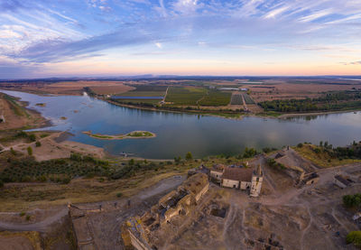 Juromenha castle, village and guadiana river drone aerial view at sunset in alentejo, portugal