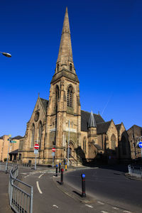 View of historic building against blue sky