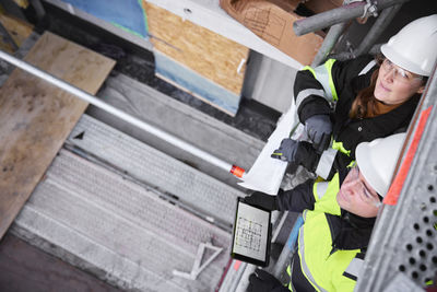 Engineers talking at building site