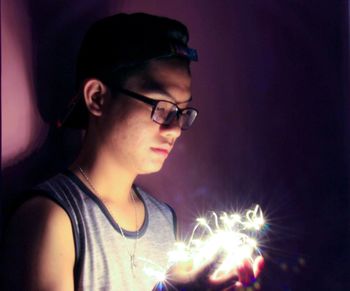 Portrait of young woman wearing sunglasses