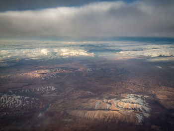 Aerial view of dramatic landscape against sky