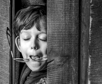 Close-up portrait of boy holding ice cream