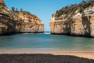 Scenic view of sea against clear blue sky