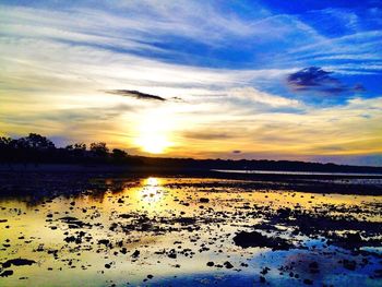 Scenic view of silhouette landscape against sky during sunset