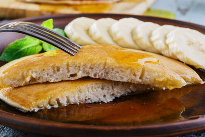 Close-up of bread in plate on table