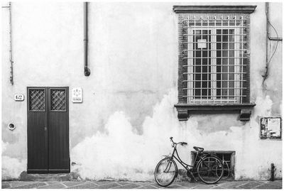 Bicycle parked outside building