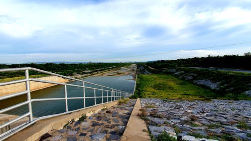 Scenic view of river against sky