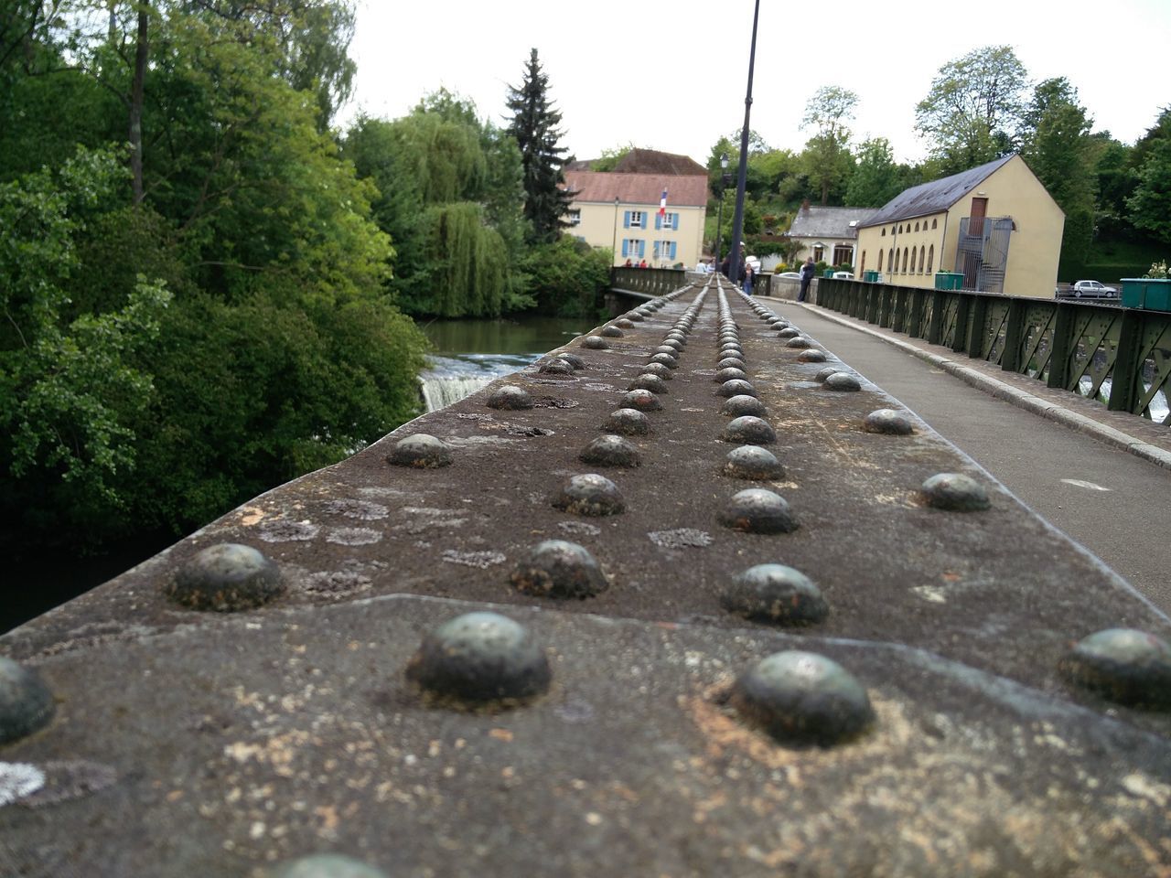 CLOSE-UP OF WALKWAY AGAINST SKY