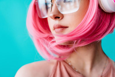 Close-up of young woman wearing sunglasses