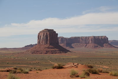 Rock formations in desert against sky