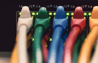 Close-up of multi colored cables connected to server