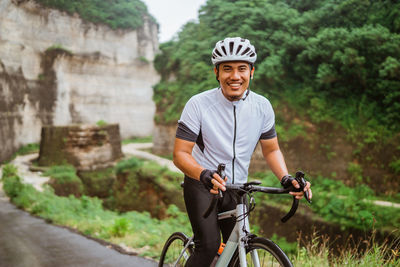 Portrait of man riding bicycle