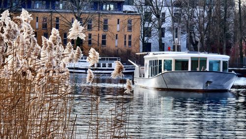 Nautical vessel in lake during winter