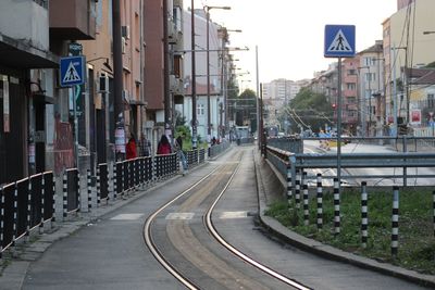 Tramway on street by buildings