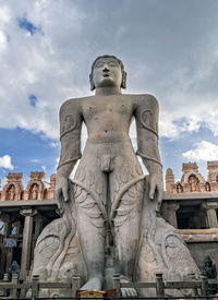 Low angle view of statue against sky