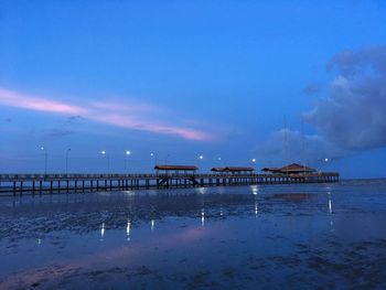 Scenic view of sea against sky at sunset