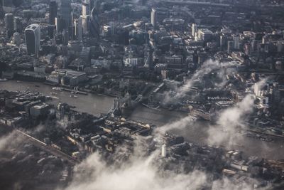 High angle view of city by river